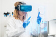 © vladim_ka - Scientist in lab coat and virtual reality VR goggle uses AR augmented reality for analysis of data. Metaverse NFT game concept.