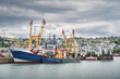 © Dawid - Large fishing boats moored in Howth harbour. Phishing and shellfish fishing equipment on fishing boats, Dublin, Ireland