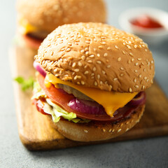 Sticker - Traditional homemade cheeseburgers with pickles