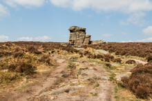 Tall Granite Rock Known As The Mother Cap In The Peak District