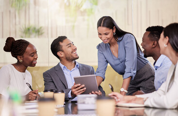 Sticker - Explore business ideas freely. Shot of a group of coworkers using a digital tablet during a business meeting.