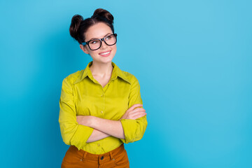 Sticker - Photo of creative minded lady representative cross arms look empty space working ads isolated blue color background