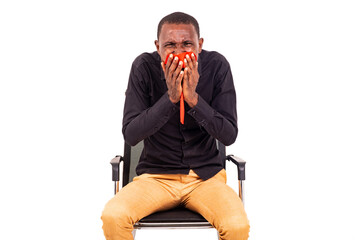 Poster - business man sitting and covering mouth with tie.