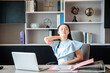 © topkritsada - A businesswoman who works in the office looks tired and stressed by pressing her hands