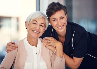 Sticker - I have a pillar of strength in her. Cropped portrait of a young female nurse embracing a senior woman sitting in a wheelchair in a nursing home.