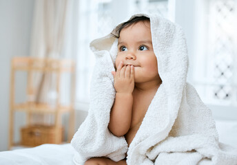 Canvas Print - I taste so fresh. Shot of an adorable baby covered in a towel after bath time.