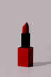 red lipstick, white background. Cosmetics