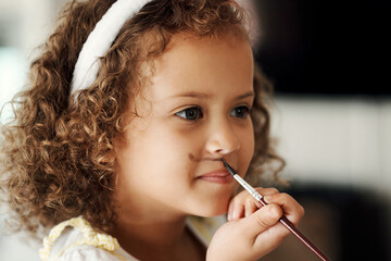 Poster - I wont wash this off. Shot of a little girl painting her face to look like a bunny.