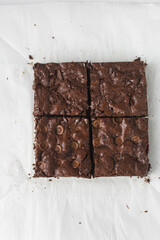 Sticker - Dark chocolate brownies with caramel on parchment paper