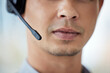 Speak to us, well sort you out. Closeup shot of a call centre agent working in an office.