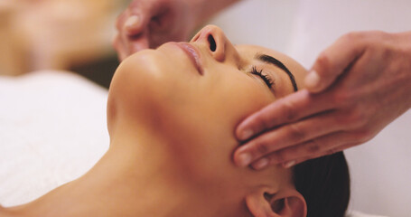 Poster - My mind is finally at ease. Shot of a beautiful young woman enjoying a head massage at a beauty spa.