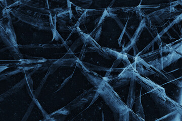 Wall Mural - ice texture cracks baikal, abstract background winter ice transparent blue