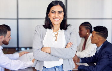 Canvas Print - Unafraid and goal bound. Shot of a young businesswoman in the middle of a meeting.