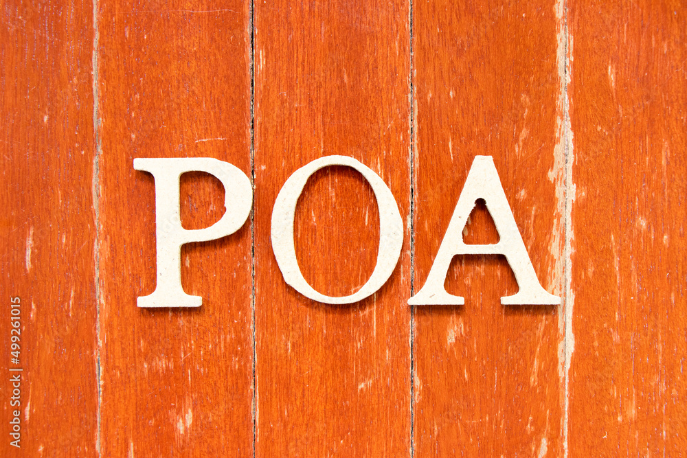 Alphabet letter in word POA (Abbreviation of Plan of action, Power of attorney, Period of availability or Paid on arrival) on old red color wood plate background