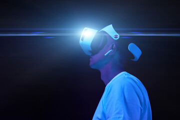 Wall Mural - man interting with virtual reality using vr headset.