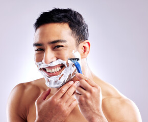 Canvas Print - If youre like me, you like taking it all off. Cropped shot of a handsome young man shaving his facial hair.