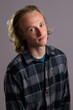 © Tasman - Portrait of Boy With Long Blonde Hair
