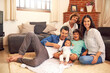 © T Chithambo/peopleimages.com - This is our idea of happiness. Full length portrait of an affectionate young family spending quality time together at home.
