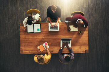 Aufkleber - All set for a successful collaboration. High angle shot of a group of businesspeople having a meeting in a modern office.