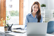 © Daenin - girl working at office on desk with computer graph work concept. beautiful smile