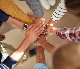 Aufkleber - Their determination is strong. High angle shot of a group of people joining their hands together.