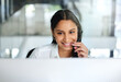 © Kirsten D/peopleimages.com - Im glad I was able to assist. Shot of an attractive young call centre agent sitting in the office and wearing a headset while using her computer.