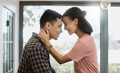 Sticker - Love is when you accept someones flaws. Shot of a couple spending time together in the kitchen at home.