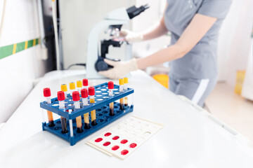 Wall Mural - lab worker preparing test blood for detection of antibodies and infections corona virus