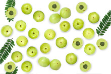 Indian Gooseberry Fruits (Amla, Phyllanthus Emblica) With Green Leaves Isolated On White Background. Top View. Flat Lay.