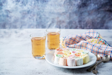 Wall Mural - Turkish delight, Oriental sweetness on a plate with tea