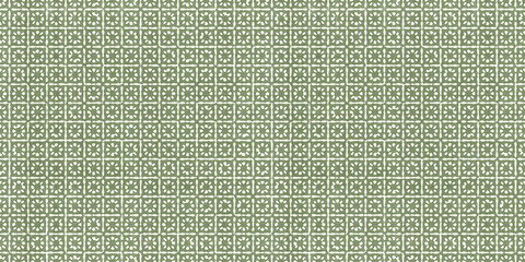 batik small floral or sun motif in geometric squares on distressed boho textured linen in sage green