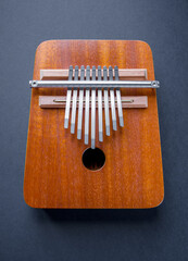 Canvas Print - Traditional wooden kalimba isolated on black