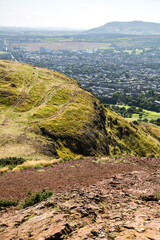 Sticker - Scotland, Edinburgh.  Holyrood park and ancient volcano. Beautiful panoramic view City of Edinburgh  from the mountain