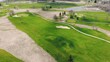 Aerial footage of golf course. Green grass in spring and the beginning of the golf season.