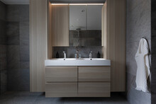 Nice And Moody Bathroom With Double Sinks With Shower Showing In The Mirror