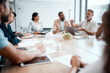 Poster - Scaling down will help our budget. Shot of a group of staff listening to their boss during a business meeting.