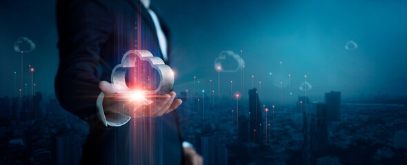 Leinwandbilder - Cloud computing concept, Businessman hold cloud computing icon and connect to cloud data technology on global network connection with city background