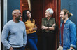 © Allistair/peopleimages.com - These chats always inspire us to do better. Shot of a group of businesspeople having a discussion together while standing outside their office building.