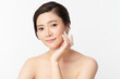 © kitthanes  - Beautiful young asian woman with clean fresh skin on white background, Face care, Facial treatment, Cosmetology, beauty and spa, Asian women portrait.