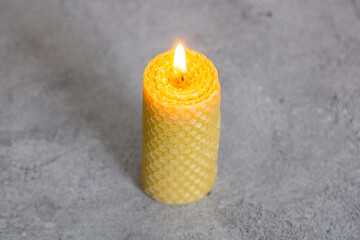 Wall Mural - A candle made of honeycomb