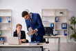© Elnur - Two colleagues working in the office