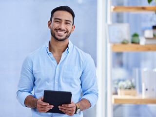 Aufkleber - I recommend everyone use a digital tablet. Shot of a young businessman using a digital tablet at work.