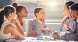 © Alex S/peopleimages.com - Keeping all their brilliant ideas flowing. Shot of a group of businesspeople having a meeting in an office.