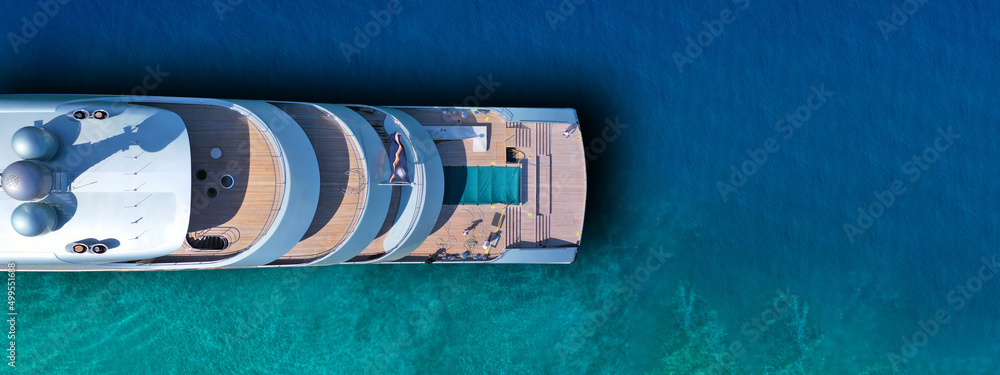 Aerial drone top view ultra wide photo of large yacht anchored in ...
