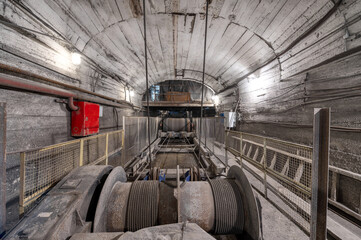 Wall Mural - Belt conveyor system in an underground tunnel. Transportation of ore to the surface