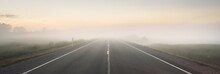 An Empty Highway (new Asphalt Road) Through The Fields And Forest In A Fog At Sunset. Soft Sunlight. Rural Scene. Remote Places, Village, Road Trip, Tourism, Route, Logistics, Freedom Concepts