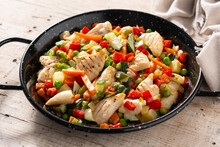 Chicken Stir Fry And Vegetables On Wooden Table	