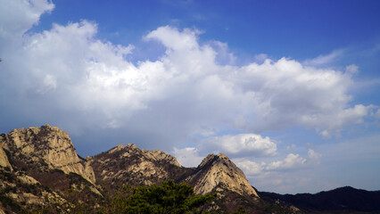 Sticker - The day after the rain, the rocky mountains and white clouds.