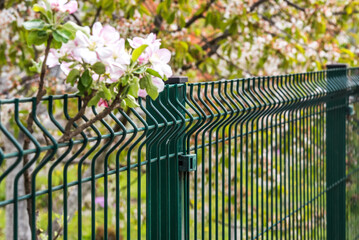 Wall Mural - Steel grating fence made with wire in spring
