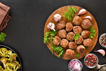 Wall Mural - Roasted meatballs on cutting board